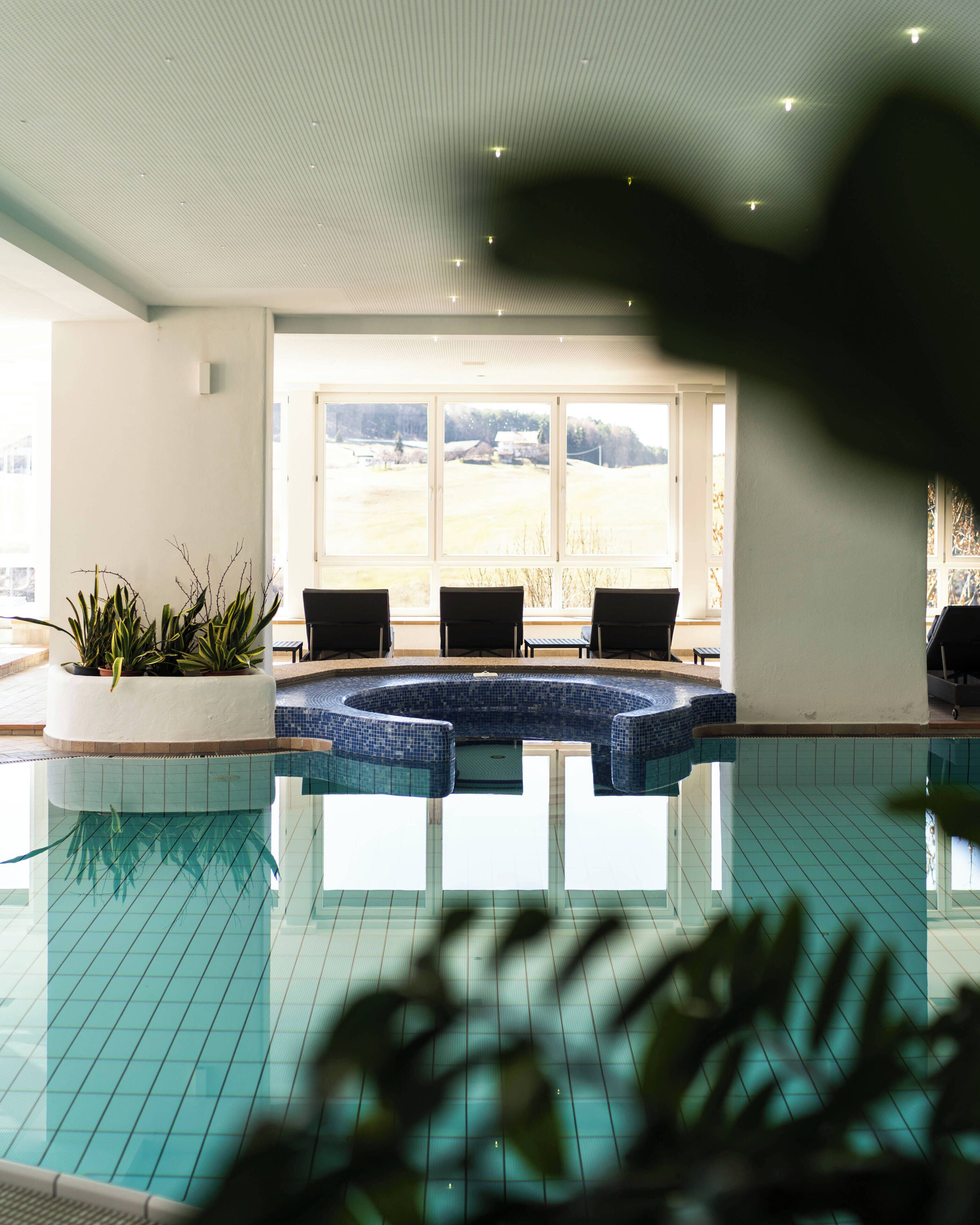 Indoor pool, outdoor pool, pool umbrellas, sun loungers