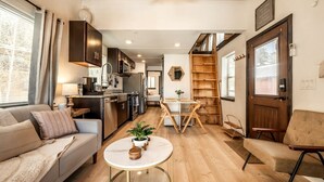 TV, fireplace - Beautiful Tiny Home Nestled in Woodland Park and near Manitou Springs, Perfect for a Weekend Getaway (Woodland Park)