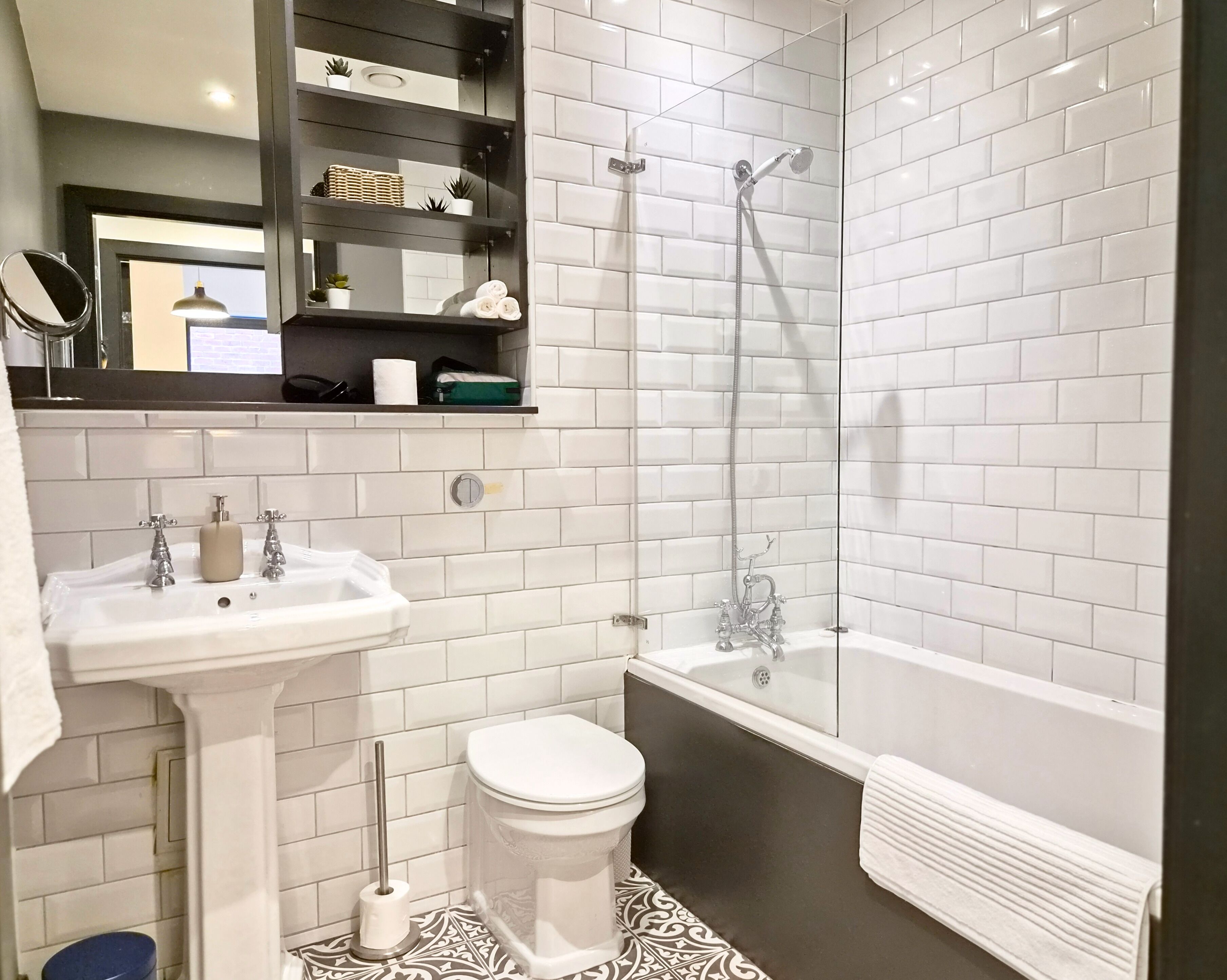 Shower, hair dryer, towels, toilet paper