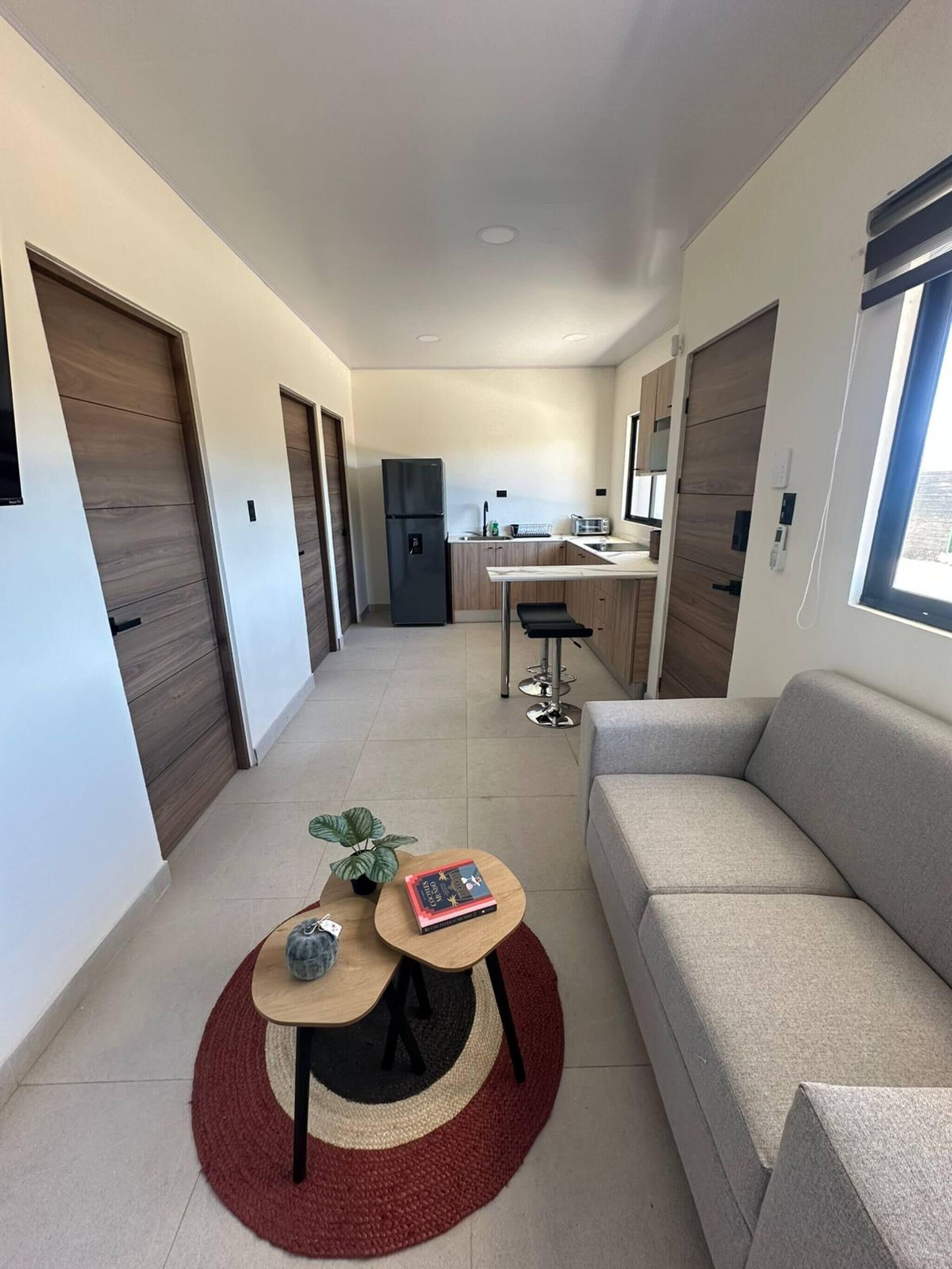 Casa, 1 habitación, vista al jardín | Área de sala de estar