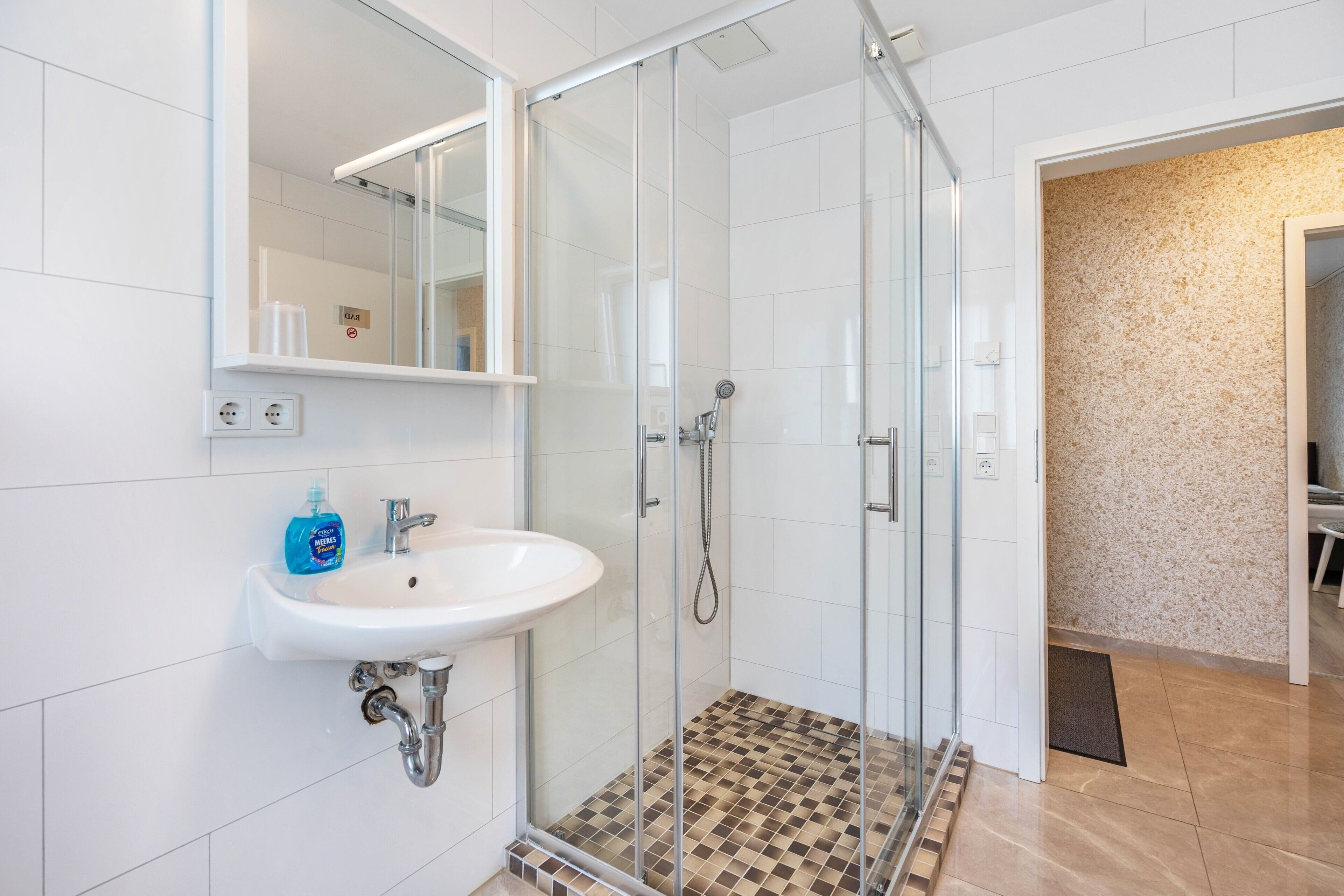 Shower, hair dryer, towels