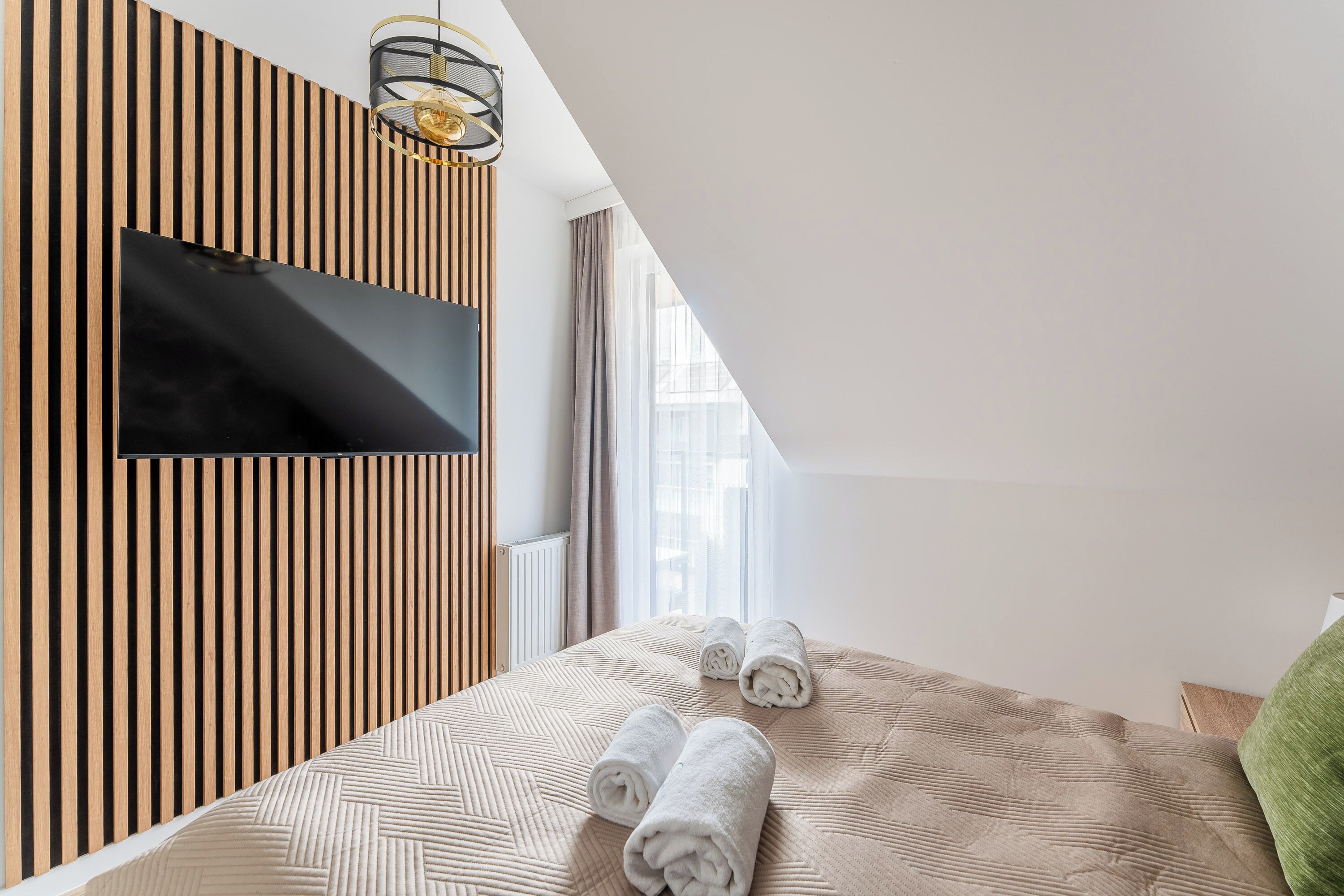 Premium bedding, laptop workspace, blackout curtains, iron/ironing board