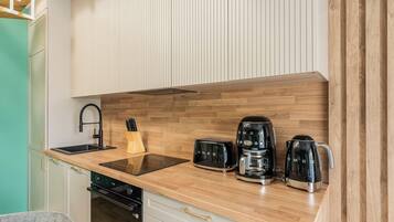 Premium Penthouse, 2 Bedrooms | Private kitchen | Fridge, microwave, stovetop, dishwasher