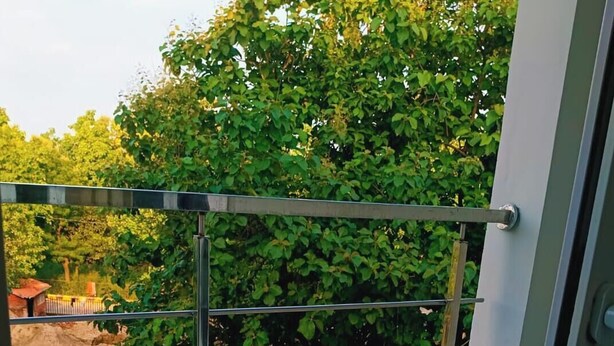 Superior tweepersoonskamer, balkon | Uitzicht op de tuin