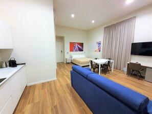 Departamento familiar, balcón | Área de sala de estar