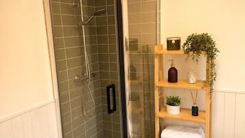 Separate tub and shower, deep soaking tub, hair dryer, towels