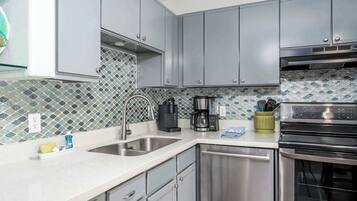 Coffee/tea maker, fridge, microwave, oven
