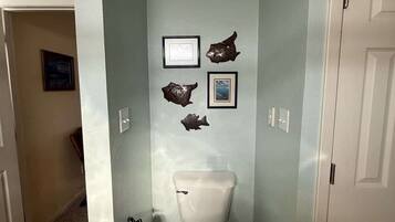 Shower, hair dryer, towels, shampoo