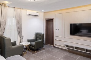 Habitación ejecutiva | Área de sala de estar