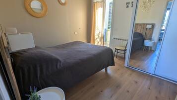 1 chambre, fer et planche à repasser, Wi-Fi, draps fournis
