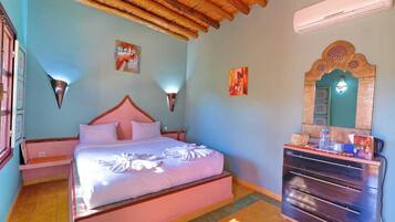 Comfort Room, 1 Queen Bed, Private Bathroom, Pool View | Living area | 55-inch TV with satellite channels
