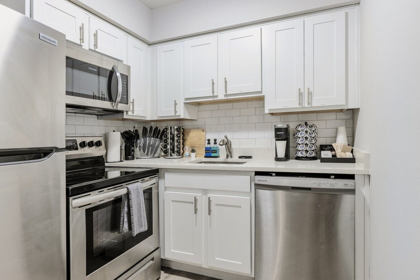 Coffee/tea maker, fridge, microwave, oven