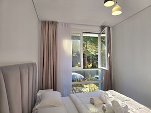 1 habitación, tabla de planchar con plancha, wifi gratis y ropa de cama 