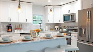 Coffee/tea maker, fridge, microwave, oven