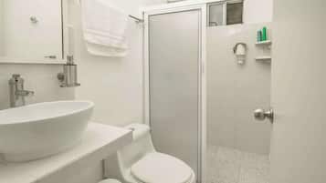 Shower, hair dryer, towels, shampoo