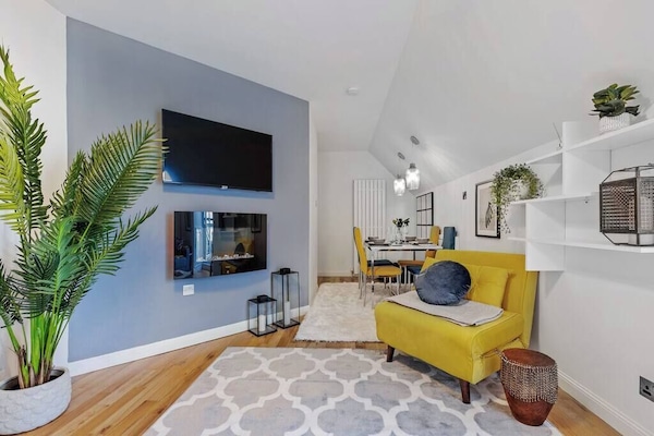 Relax and read by the cosy fire place.