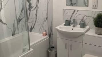 Shower, hair dryer, shampoo