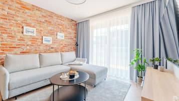 Appartement Premium, salle de bains privée | Coin séjour
