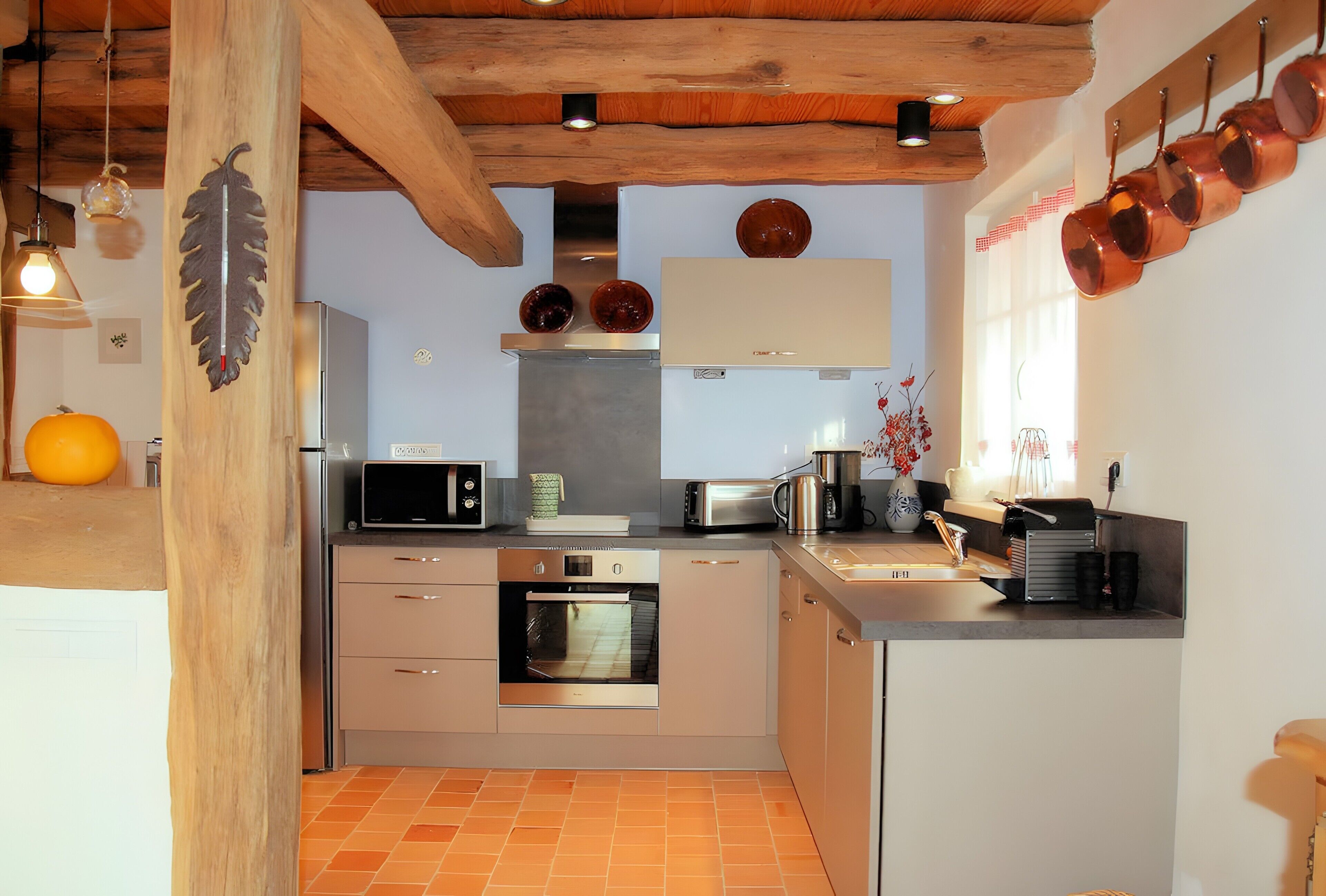Coffee/tea maker, fridge, microwave, oven