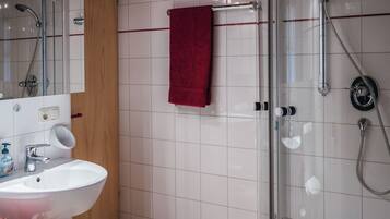 Hair dryer, towels, toilet paper