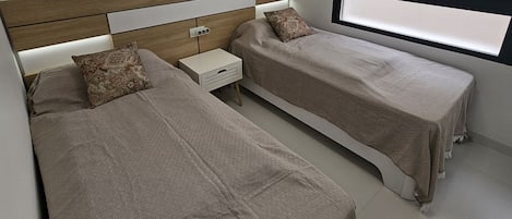 2 dormitorios y ropa de cama