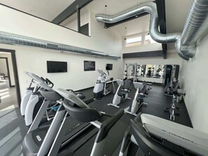 A gym with treadmills, stationary bikes, and weight machines. - 40 Mins to Glacier Park, 5 Mins to City Beach & DT (Whitefish)