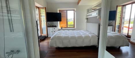 2 habitaciones, tabla de planchar con plancha, wifi y ropa de cama