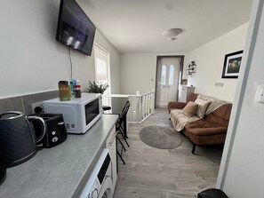 Apartamento, 1 quarto | Sala de estar