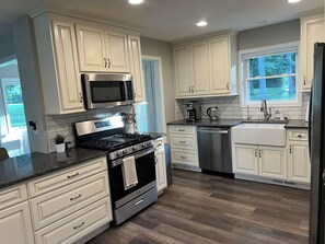 Private kitchen - Peaceful Woodland Retreat - Spacious Home on 5 Acres (Sedalia)