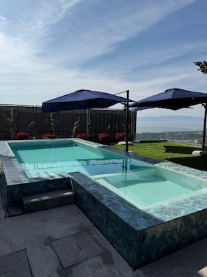 Outdoor pool, a heated pool - Luxury 5-BR villa with private chef, lake views & heated pool (Jal.)