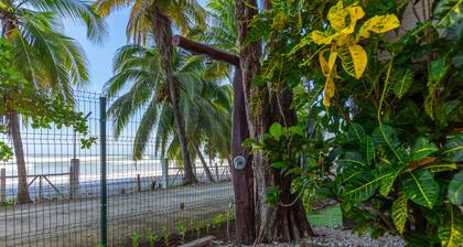 Open-air oceanfront home for 14 - steps to the sand in South Guiones, Nosara