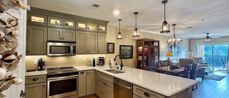 Coffee/tea maker, fridge, microwave, oven