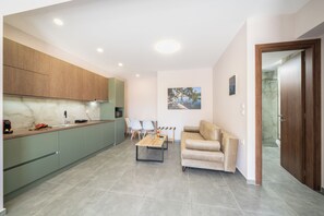 Living area - KARAVOMYLOS STUDIO by ELENI & MEMAS Luxury Apartments (SAMI)