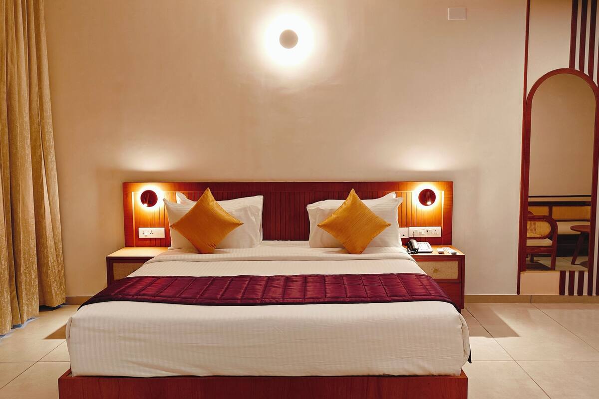 Junior Suite, Balcony, City View | In-room safe, desk, laptop workspace, blackout drapes