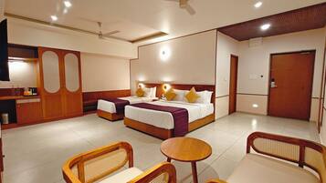 Executive Triple Room, Balcony, City View | In-room safe, desk, laptop workspace, blackout curtains