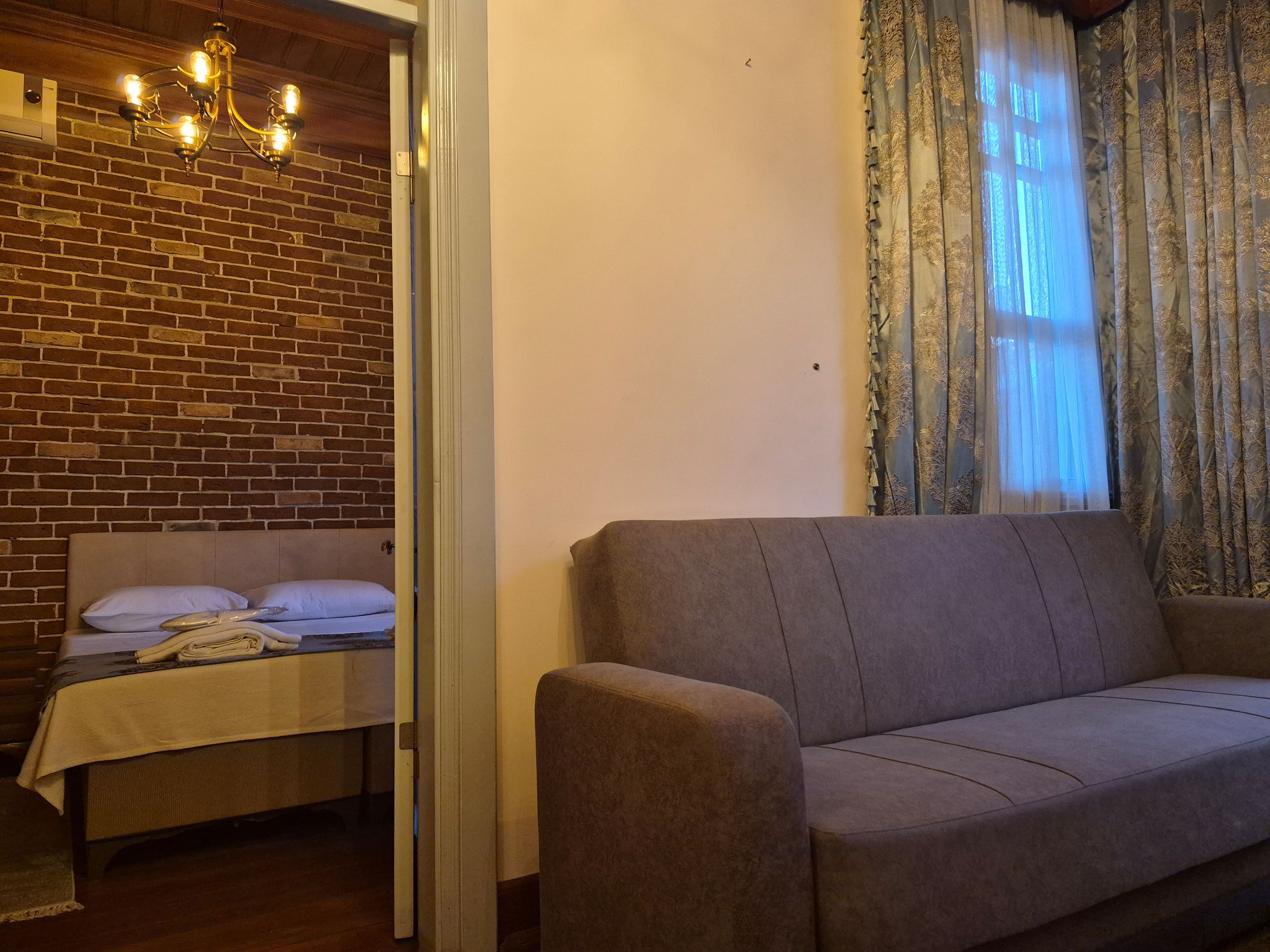 Familie suite | Een minibar, geluiddichte muren, een strijkplank/strijkijzer