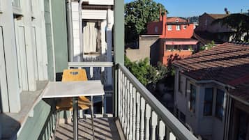 Family Condo, Balcony, City View | Outdoor dining