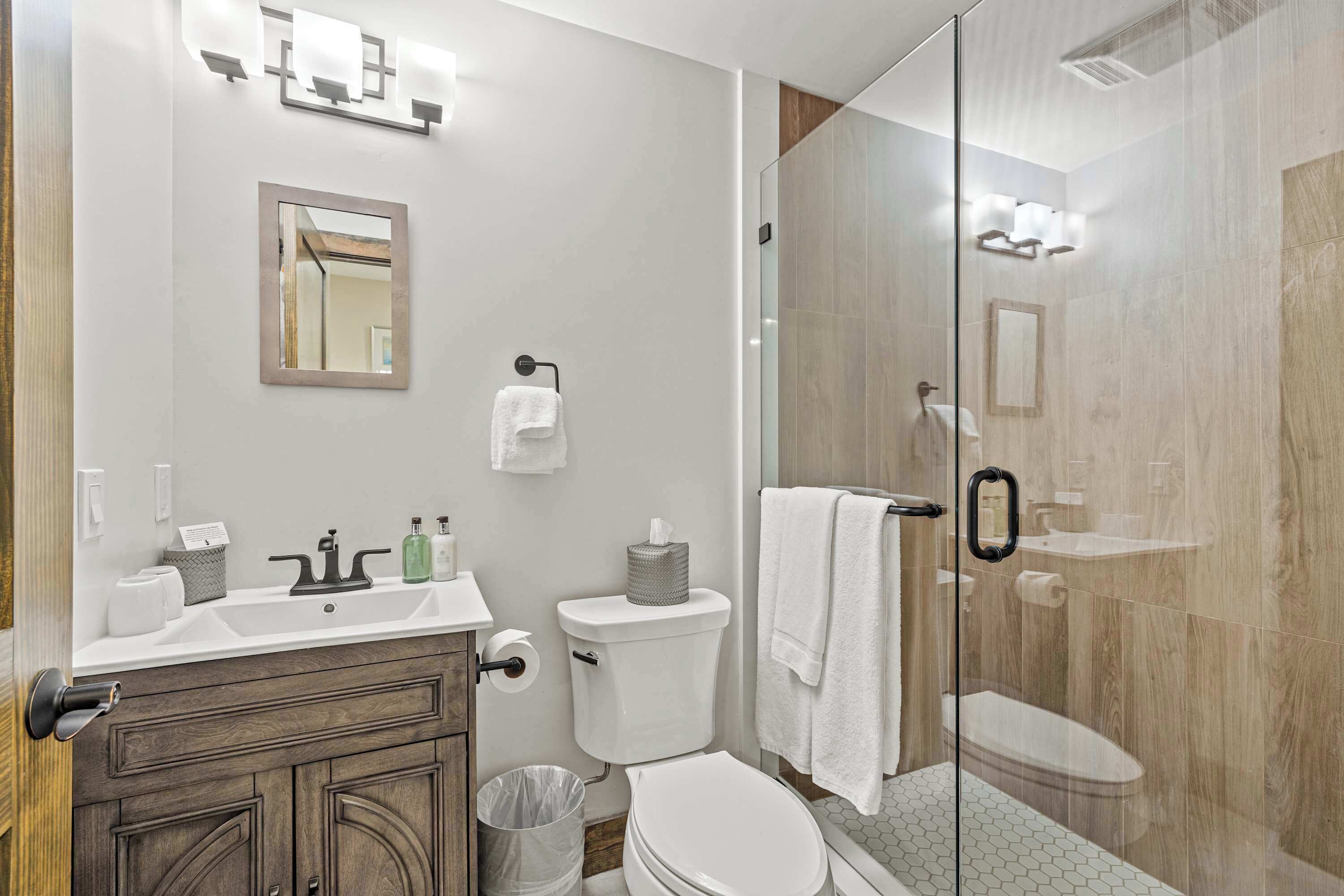 Shower, hair dryer, towels, shampoo
