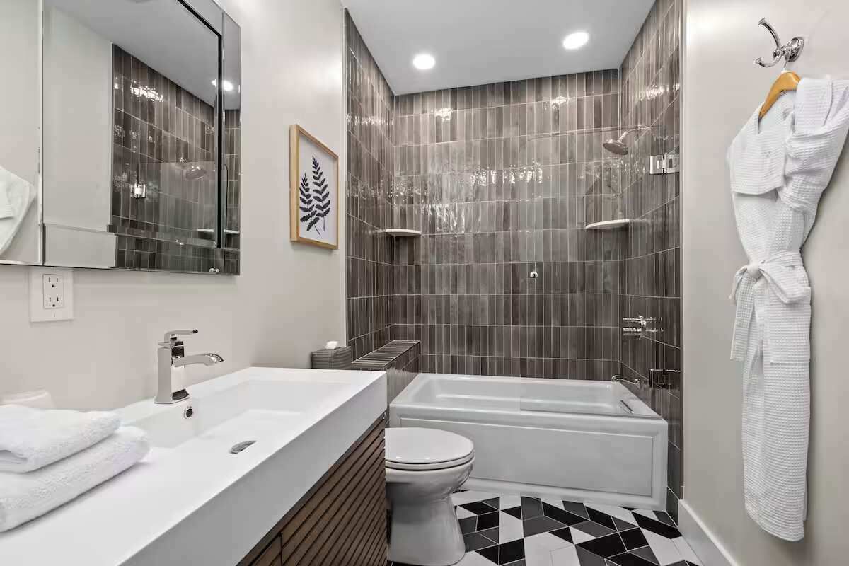 Shower, hair dryer, towels, shampoo