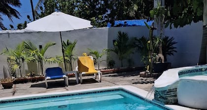 Air-conditioned house on a Caribbean beach with a pool and hot tub