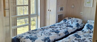 Hytte med badstue og bålplass