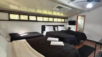 Family Suite, Garden View | Minibar, desk, free WiFi, individually decorated