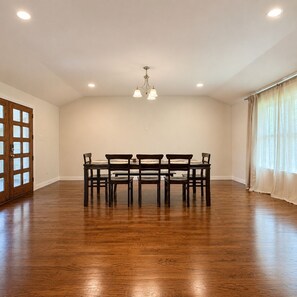 Dining - Spacious 4BR Home · Open Kitchen-Dining · Covered Patio · Sleeps 8 (Garland)