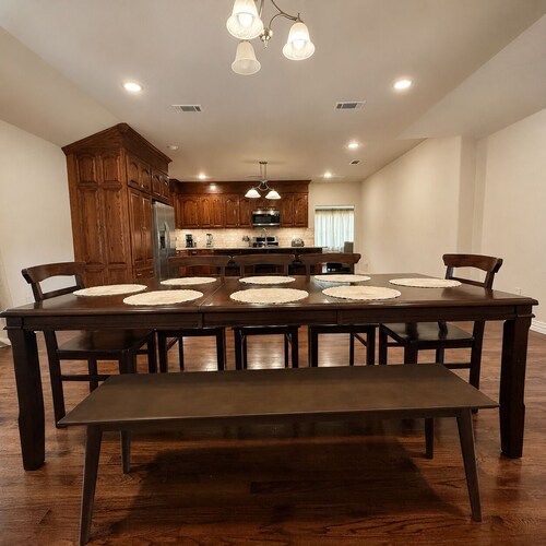 Spacious 4BR Home · Open Kitchen-Dining · Covered Patio · Sleeps 8