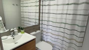 Hair dryer, towels, soap, toilet paper