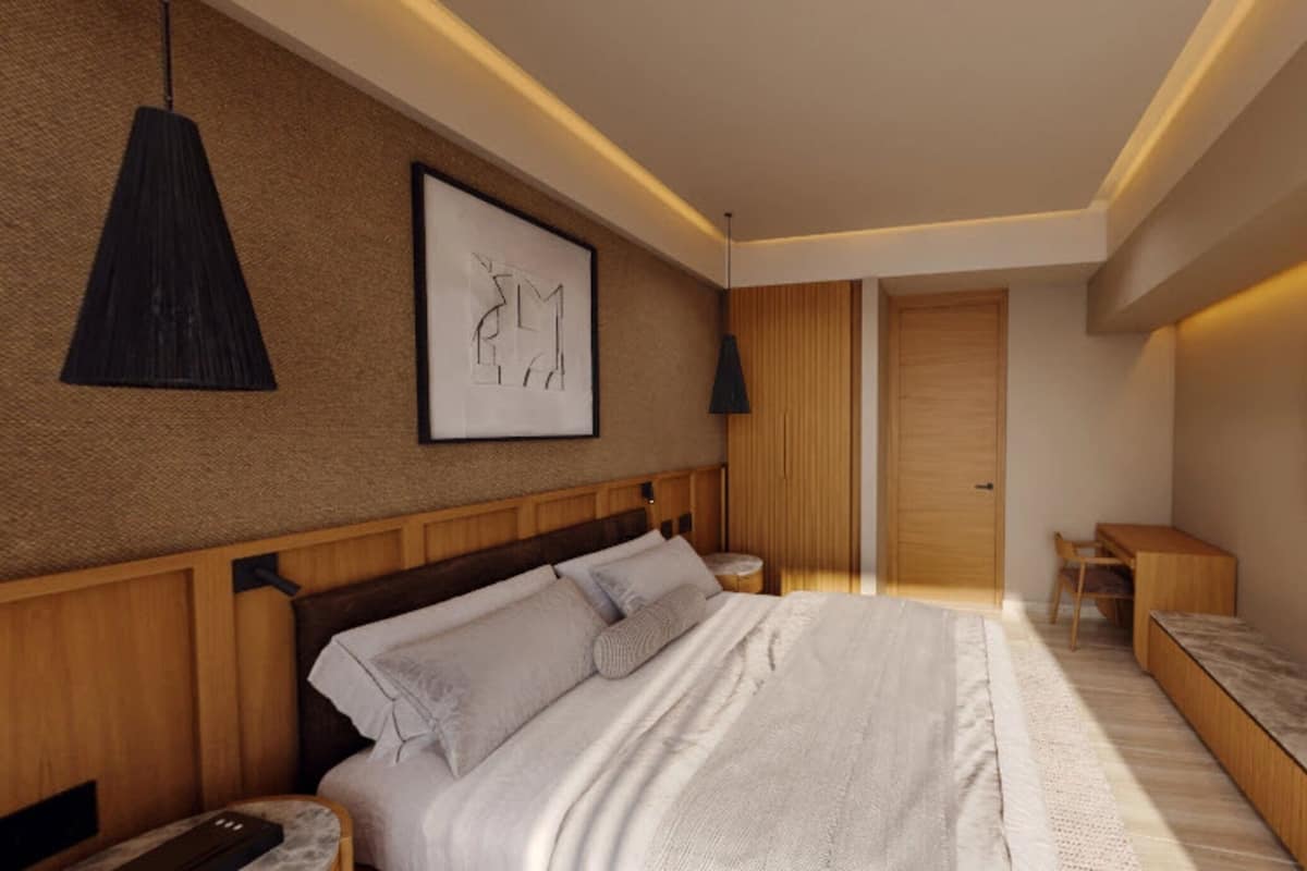 Ropa de cama de alta calidad y espacio para trabajar con laptop