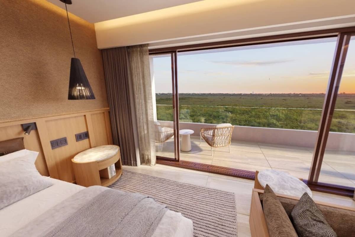 Loft Deluxe, vista parcial al mar | Ropa de cama de alta calidad y espacio para trabajar con laptop