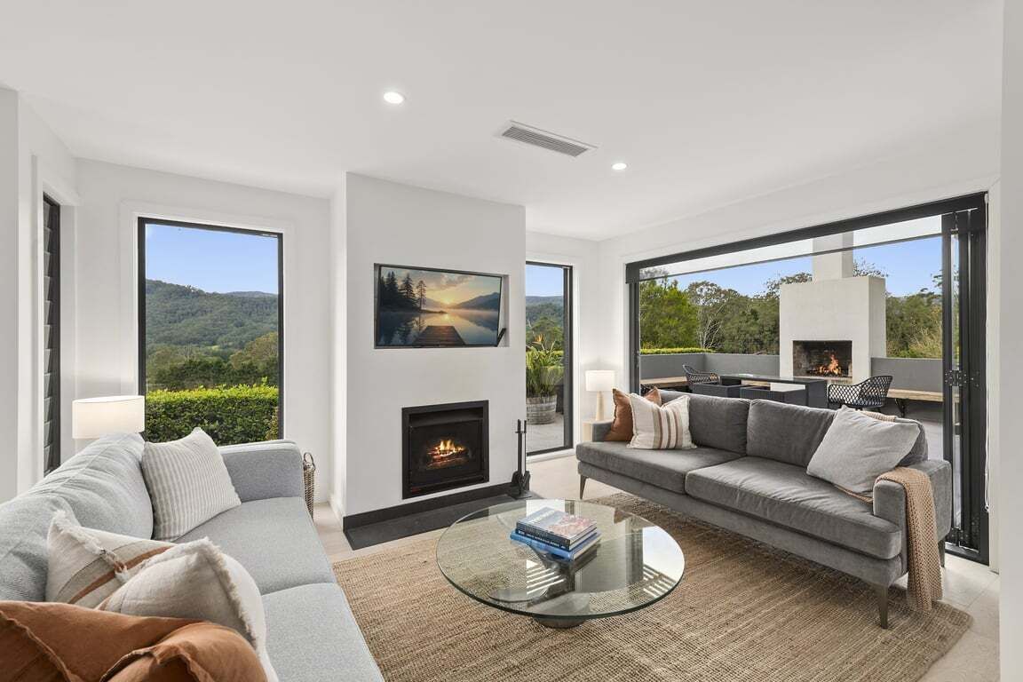 TV, fireplace, books