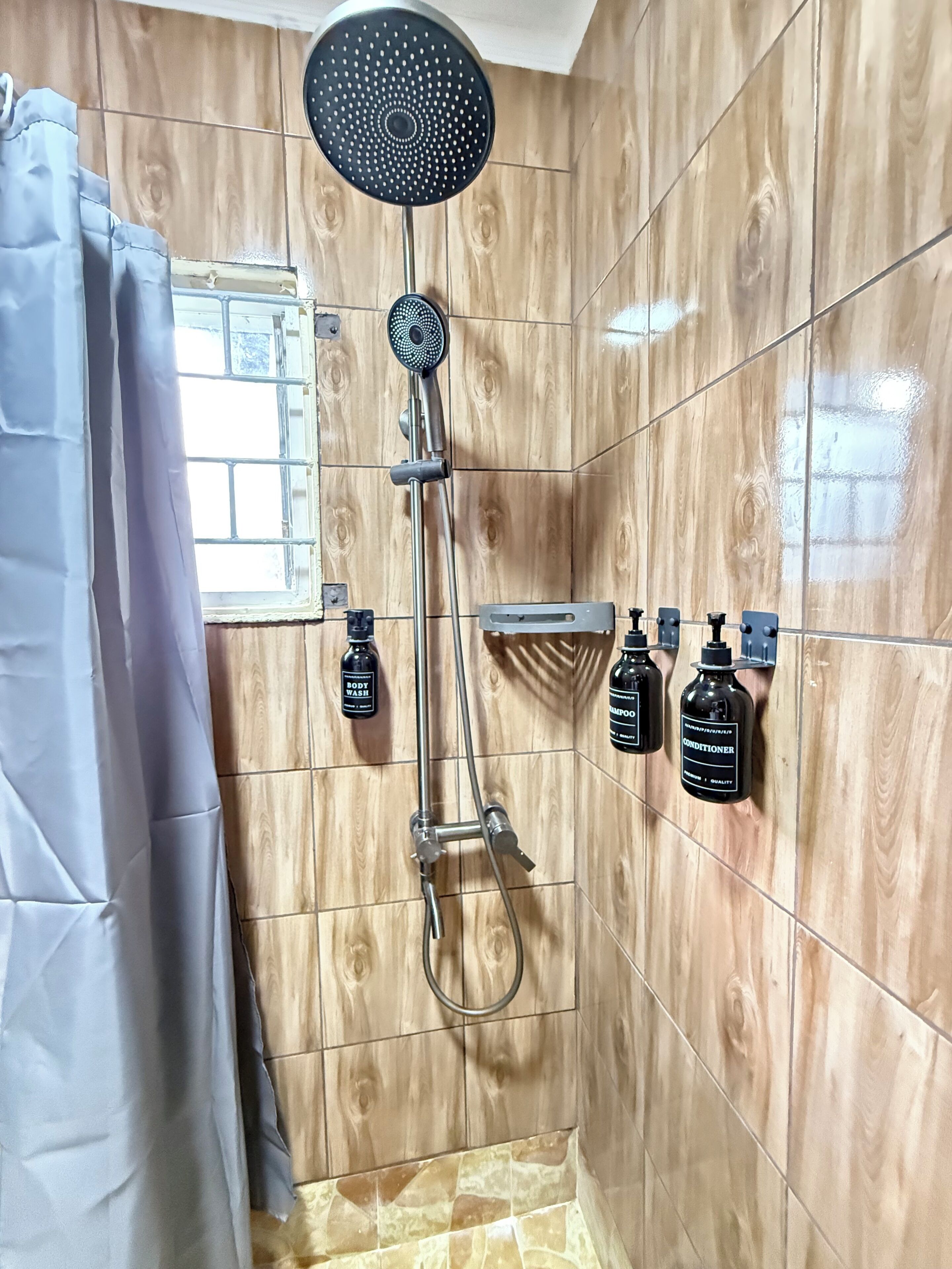 Shower, towels, soap, toilet paper