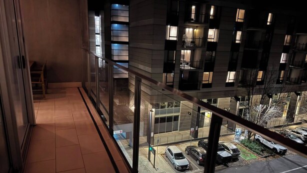 A high-rise building with multiple floors, large windows, and a parking area below. - 2B2B Executive Residence in Barton, 7-9 min walk to PH, M-Oval & Lake BG (Barton)